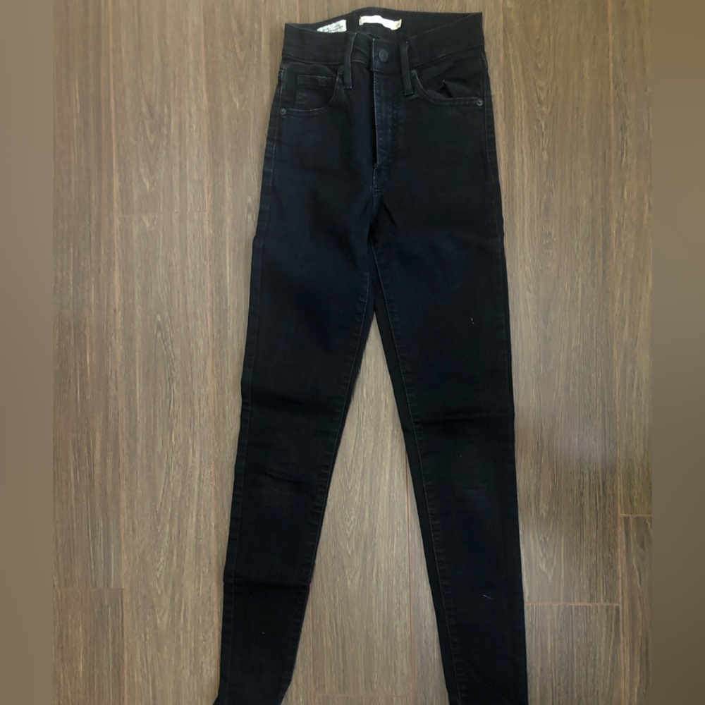 Levi’s super skinny black jeans size 24
